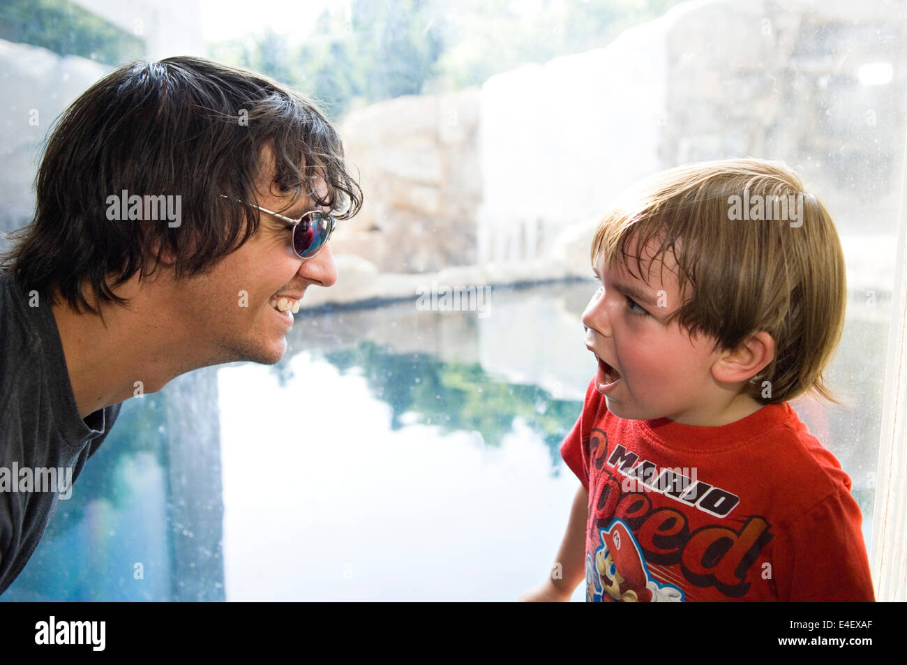 Young Father Interacting with Son at the Louisville Zoo in Kentucky Stock Photo
