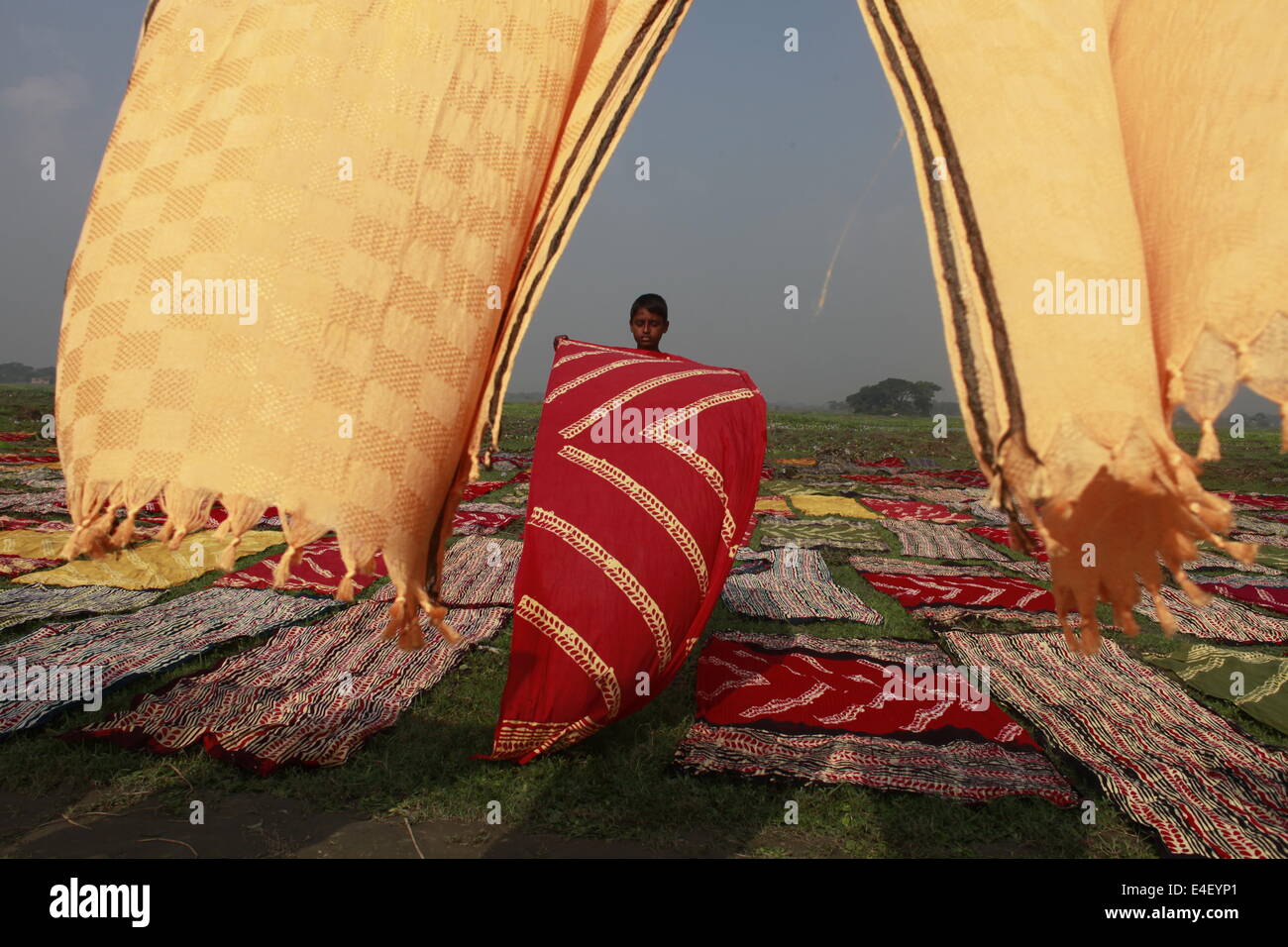 A boy is washing dyed clothes,Adult,Art,Artisan,Artist,Artistic,Asia