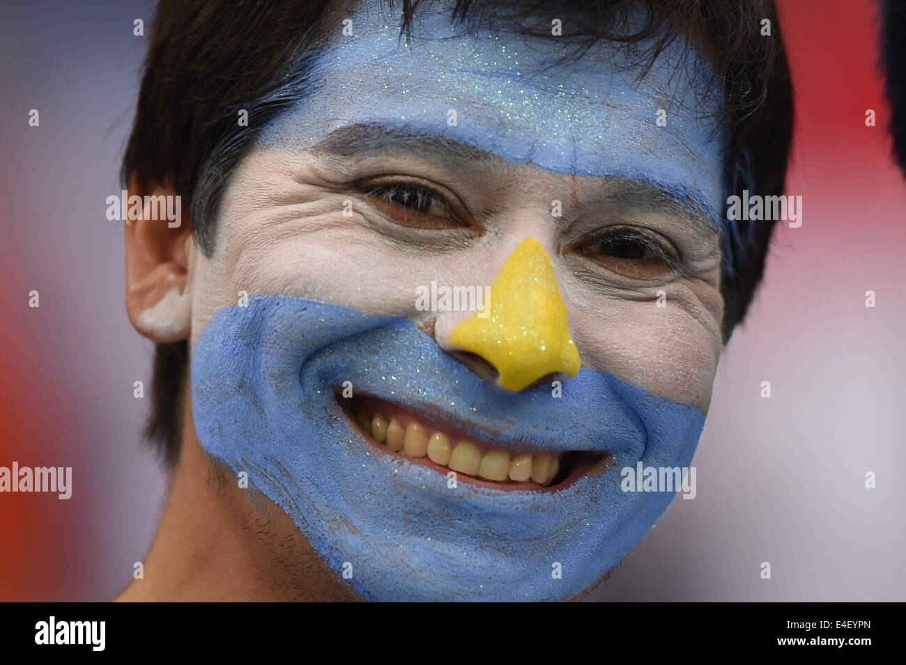 Sao Paulo, Brazil. 09th July, 2014. Supporter of Argentina cheers before the FIFA World Cup 2014 semi-final soccer match between the Netherlands and Argentina at the Arena Corinthians in Sao Paulo, Brazil, 09 July 2014. Photo: Marius Becker/dpa/Alamy Live News Stock Photo