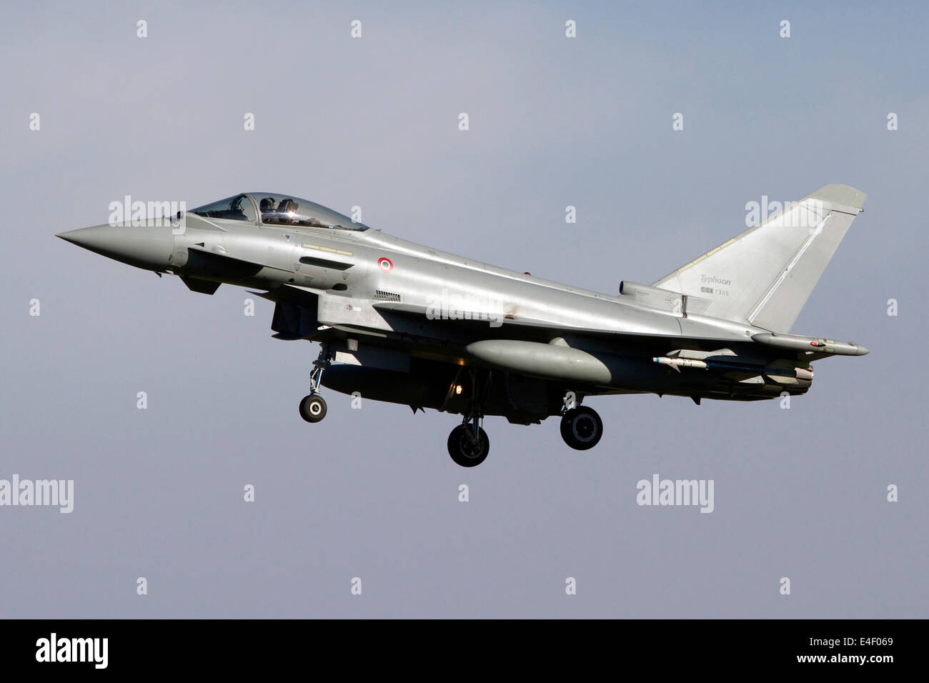 A Eurofighter Typhoon 2000 multirole fighter aircraft of the Italian Air Force in flight over Italy. Stock Photo