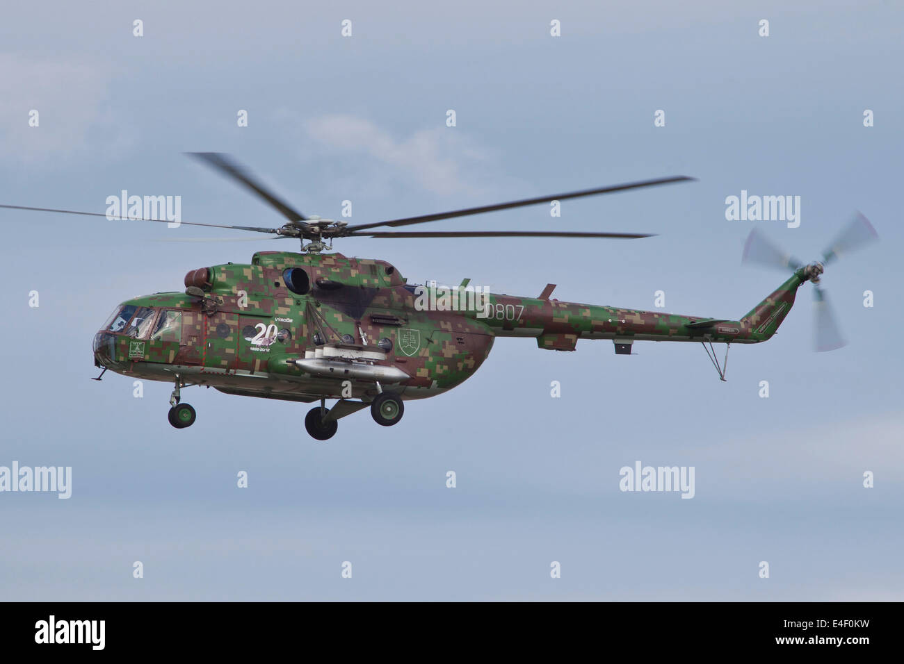 Slovakian Mi-17 with digital camouflage and gun pod during NATO Exercise Ramstein Rover, Namest, Czech Republic. Stock Photo