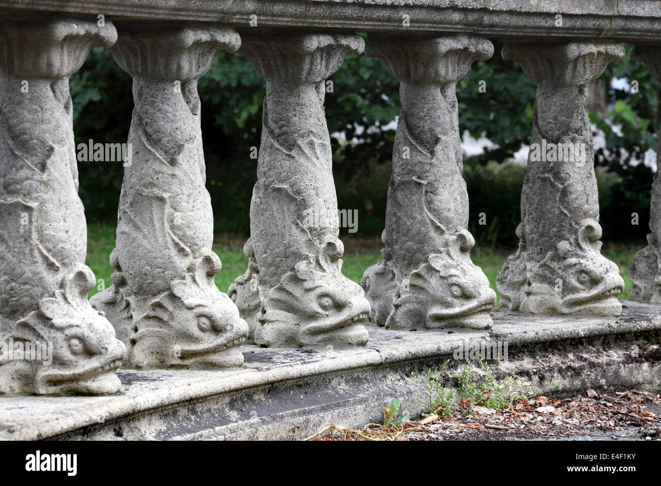 Dolphin columns in a balustrade at the entrance to Preston Park, Brighton. Stock Photo