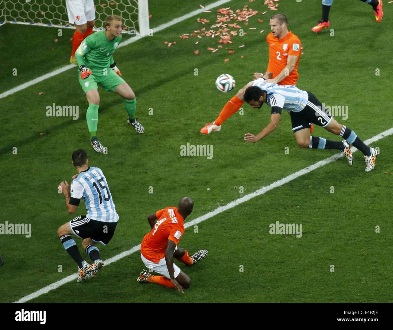 Sao Paulo, Brazil. 9th July, 2014. Argentina's Ezequiel Garay (No.2) shoots a header during a semifinal match between Netherlands and Argentina of 2014 FIFA World Cup at the Arena de Sao Paulo Stadium in Sao Paulo, Brazil, on July 9, 2014. Credit:  Liao Yujie/Xinhua/Alamy Live News Stock Photo