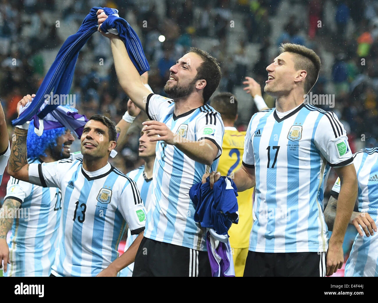 Sao Paulo, Brazil. 09th July, 2014. Argentina's Augusto Fernandez (L-R), Gonzalo Higuain and Federico Fernandez celebrate after winning the FIFA World Cup 2014 semi-final soccer match between the Netherlands and Argentina at the Arena Corinthians in Sao Paulo, Brazil, 09 July 2014. Photo: Marius Becker/dpa/Alamy Live News Stock Photo