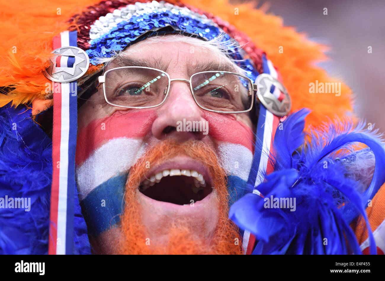 Sao Paulo, Brazil. 09th July, 2014. Supporter of the Netherlands cheers before the FIFA World Cup 2014 semi-final soccer match between the Netherlands and Argentina at the Arena Corinthians in Sao Paulo, Brazil, 09 July 2014. Photo: Marius Becker/dpa/Alamy Live News Stock Photo