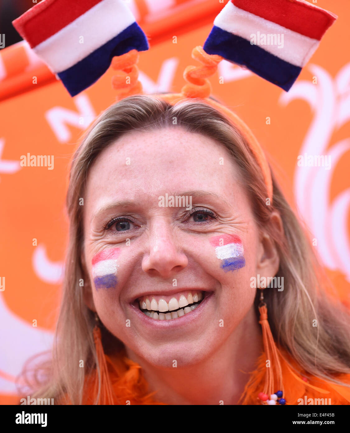 Sao Paulo, Brazil. 09th July, 2014. Supporter of the Netherlands cheers before the FIFA World Cup 2014 semi-final soccer match between the Netherlands and Argentina at the Arena Corinthians in Sao Paulo, Brazil, 09 July 2014. Photo: Marius Becker/dpa/Alamy Live News Stock Photo
