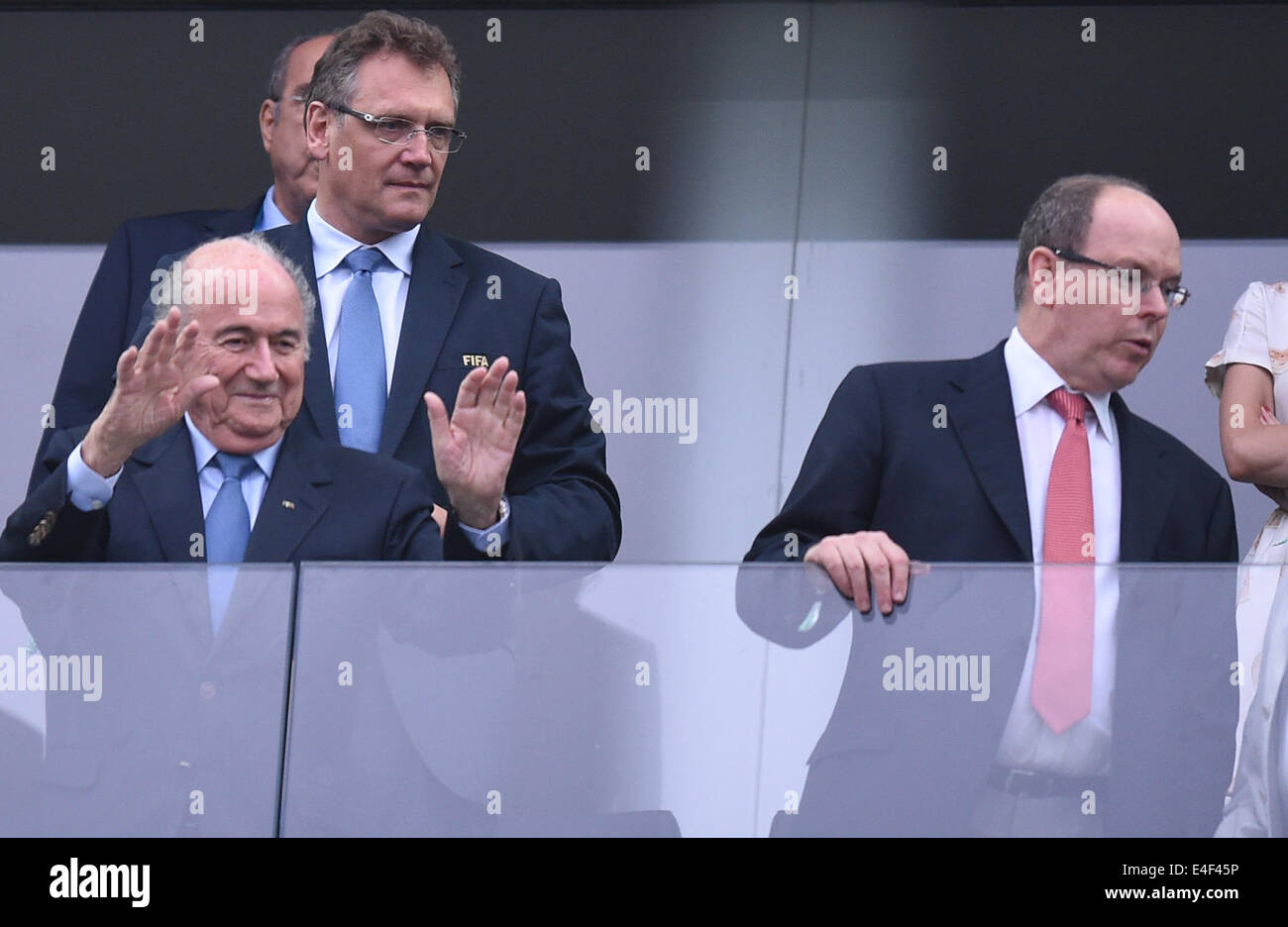 Sao Paulo, Brazil. 09th July, 2014. President of FIFA (Fédération Internationale de Football Association), Joseph 'Sepp' Blatter (L), Prince Albert (R) II of Monaco and FIFA Secretary General Jerome Valcke (C) seen in the stands during the FIFA World Cup 2014 semi-final soccer match between the Netherlands and Argentina at the Arena Corinthians in Sao Paulo, Brazil, 09 July 2014. Photo: Marius Becker/dpa/Alamy Live News Stock Photo