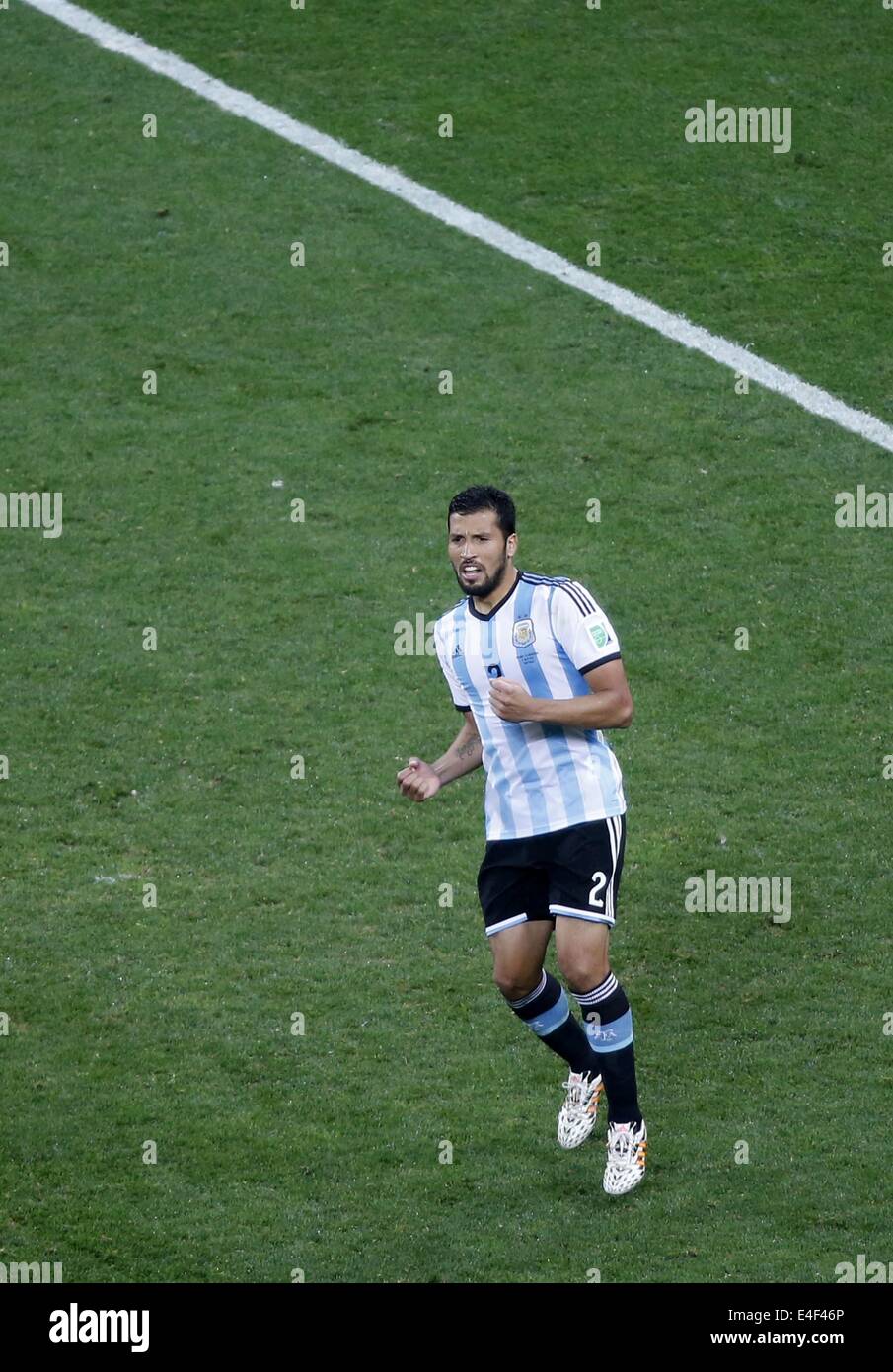 Sao Paulo, Brazil. 9th July, 2014. Argentina's Ezequiel Garay celebrates a penalty goal during the penalty shoot-out of a semifinal match between Netherlands and Argentina of 2014 FIFA World Cup at the Arena de Sao Paulo Stadium in Sao Paulo, Brazil, on July 9, 2014. Argentina won 4-2 on penalties over Netherlands after a 0-0 tie and qualified for the final on Wednesday. Credit:  Liao Yujie/Xinhua/Alamy Live News Stock Photo