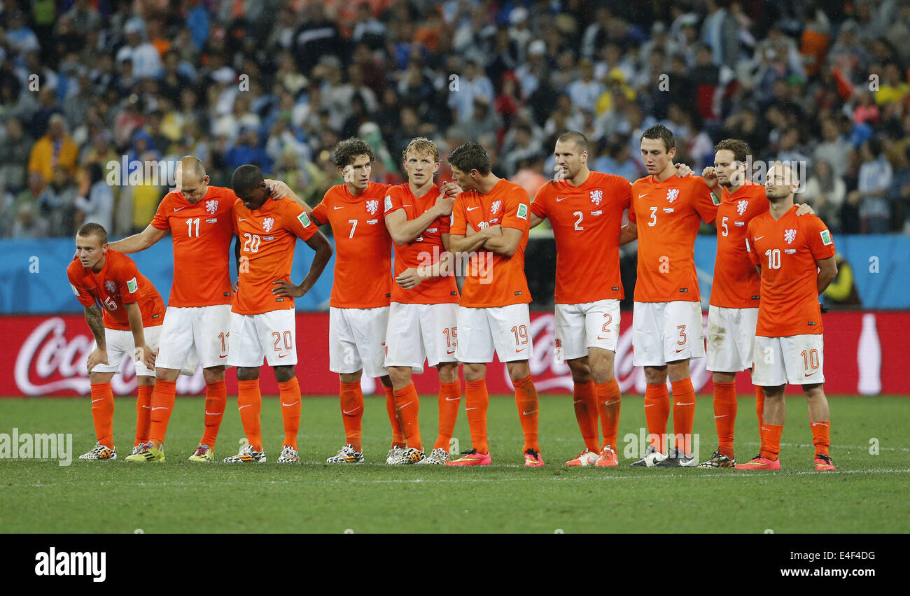Sao Paulo, Brazil. 9th July, 2014. Netherlands' Jordy Clasie, Arjen Robben, Georginio Wijnaldum, Daryl Janmaat, Dirk Kuyt, Klaas-Jan Huntelaar, Ron Vlaar, Stefan de Vrij, Daley Blind and Wesley Sneijder (L to R) lines up in the penalty shoot-out during a semifinal match between Netherlands and Argentina of 2014 FIFA World Cup at the Arena de Sao Paulo Stadium in Sao Paulo, Brazil, on July 9, 2014. Argentina won 4-2 on penalties over Netherlands after a 0-0 tie and qualified for the final on Wednesday. Credit:  Zhou Lei/Xinhua/Alamy Live News Stock Photo