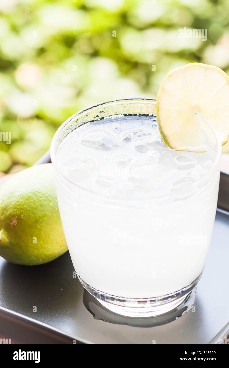 Full glass of fresh cool soda with lime Stock Photo