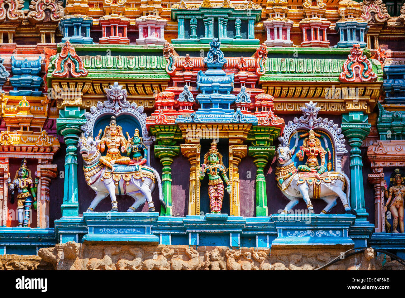 Shiva and Parvati on bull images. Sculptures on Hindu temple gopura (tower). Minakshi Temple, Madurai, Tamil Nadu, India Stock Photo