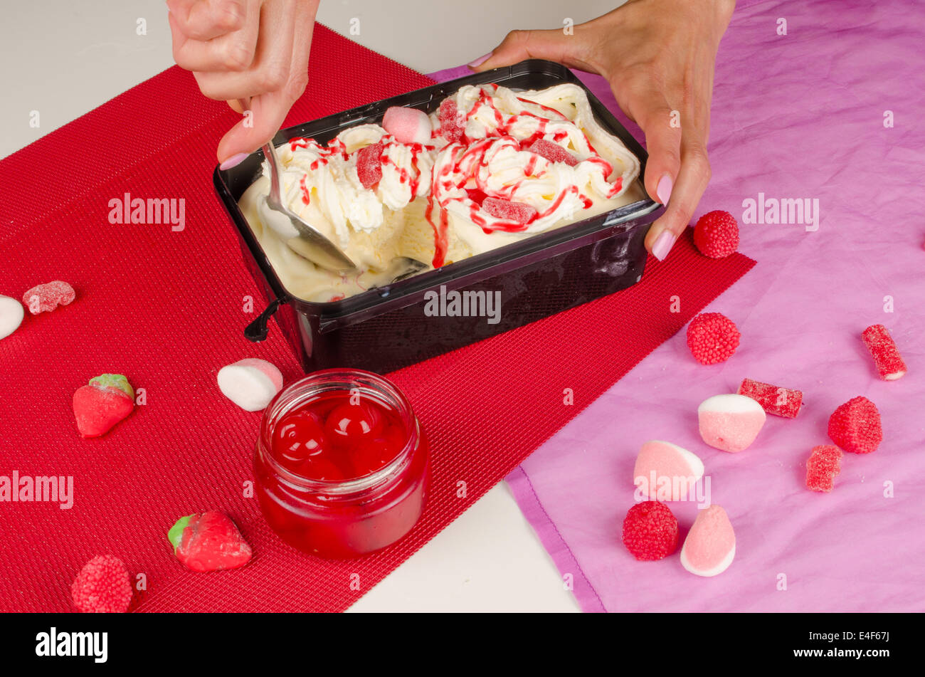 Spoon Tucking Into A Massive Portion Of Cloying Ice Cream Stock Photo Spoon Tucking Into A Massive Portion Of Cloying Ice Cream Stock Photo