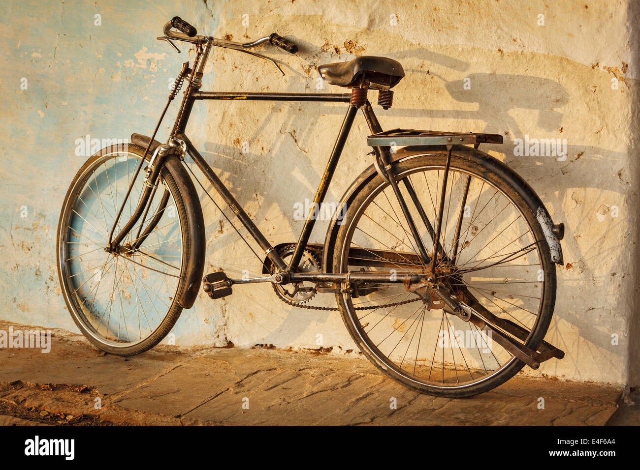 Old Indian bicycle in the street of India Stock Photo