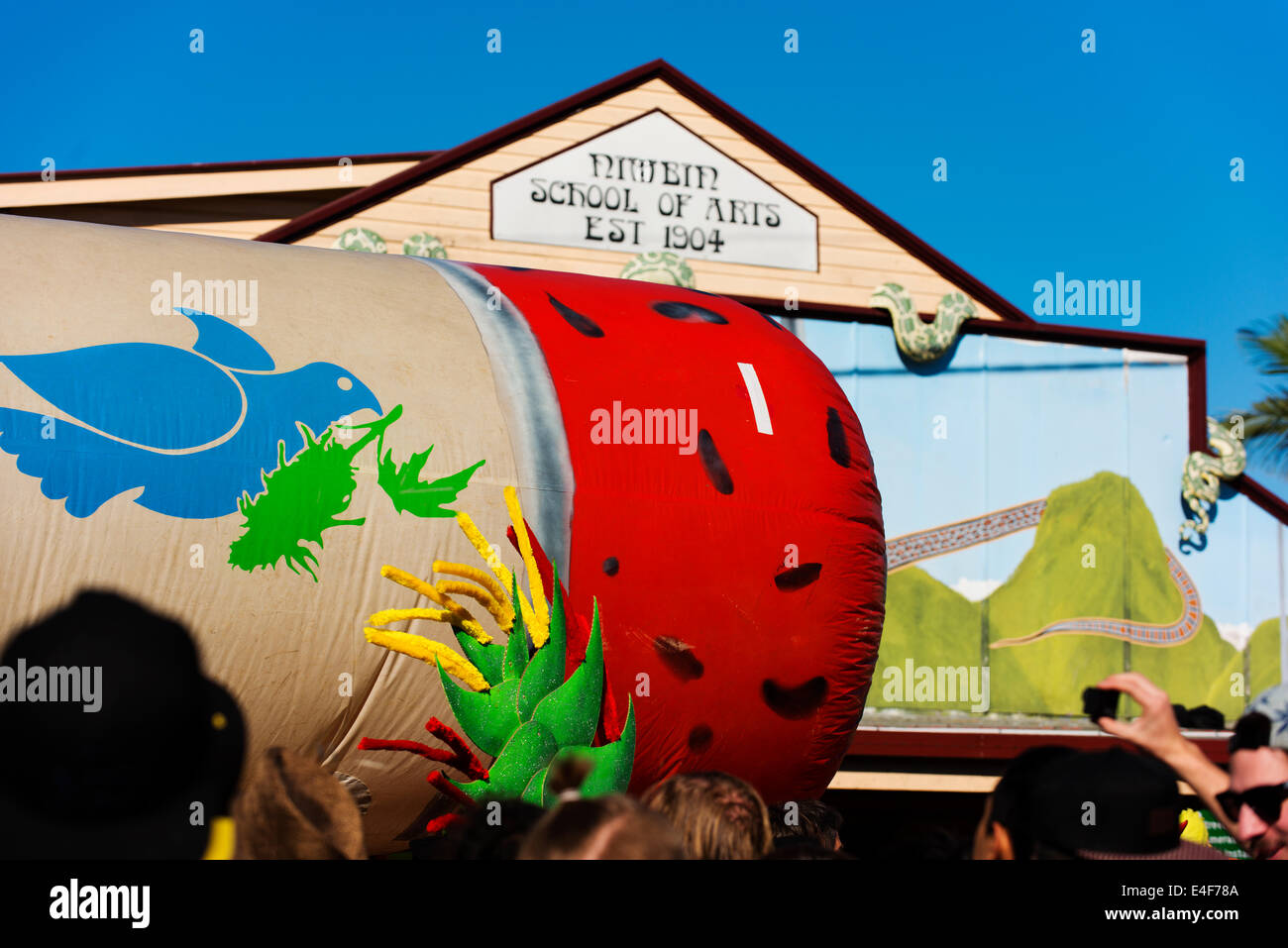 The giant joint is carried through Nimbin's main street during the