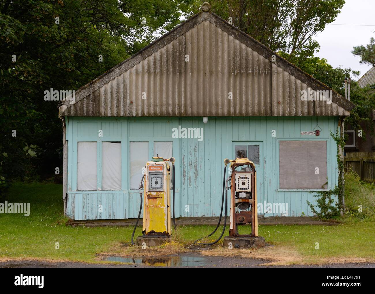 Derelict petrol station and pumps in Brora, Scotland, UK Stock Photo