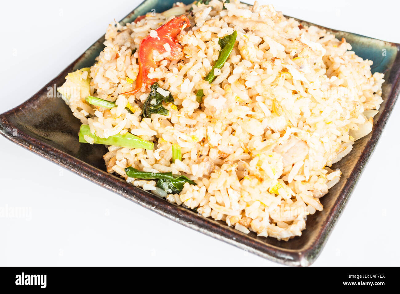 Fried rice with deep fried pork garlic and vegetable Stock Photo