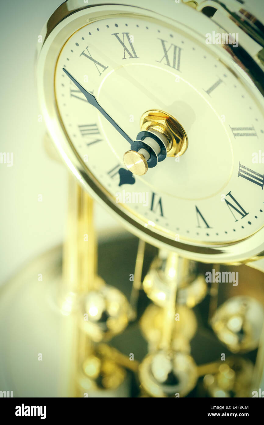 Table period clock with oscillating mechanism Stock Photo