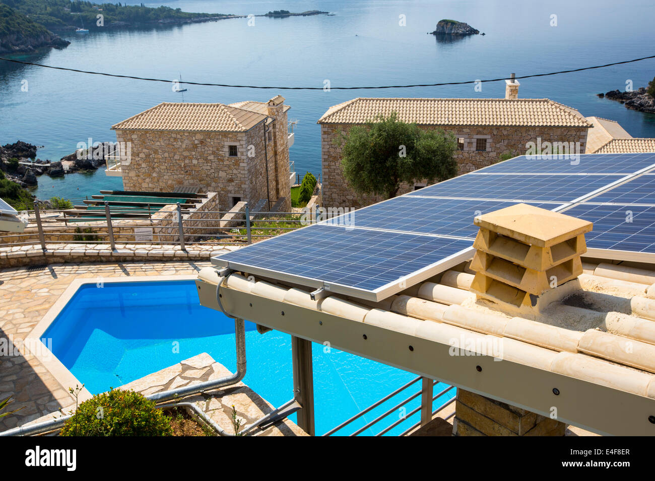 Solar panels on a house roof in Sivota, Greece. Stock Photo