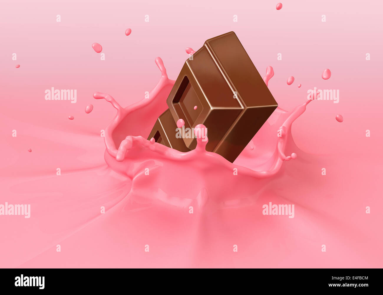 Chocolate blocks splashing into a pink milkshake. Close-up bird eye view. Stock Photo