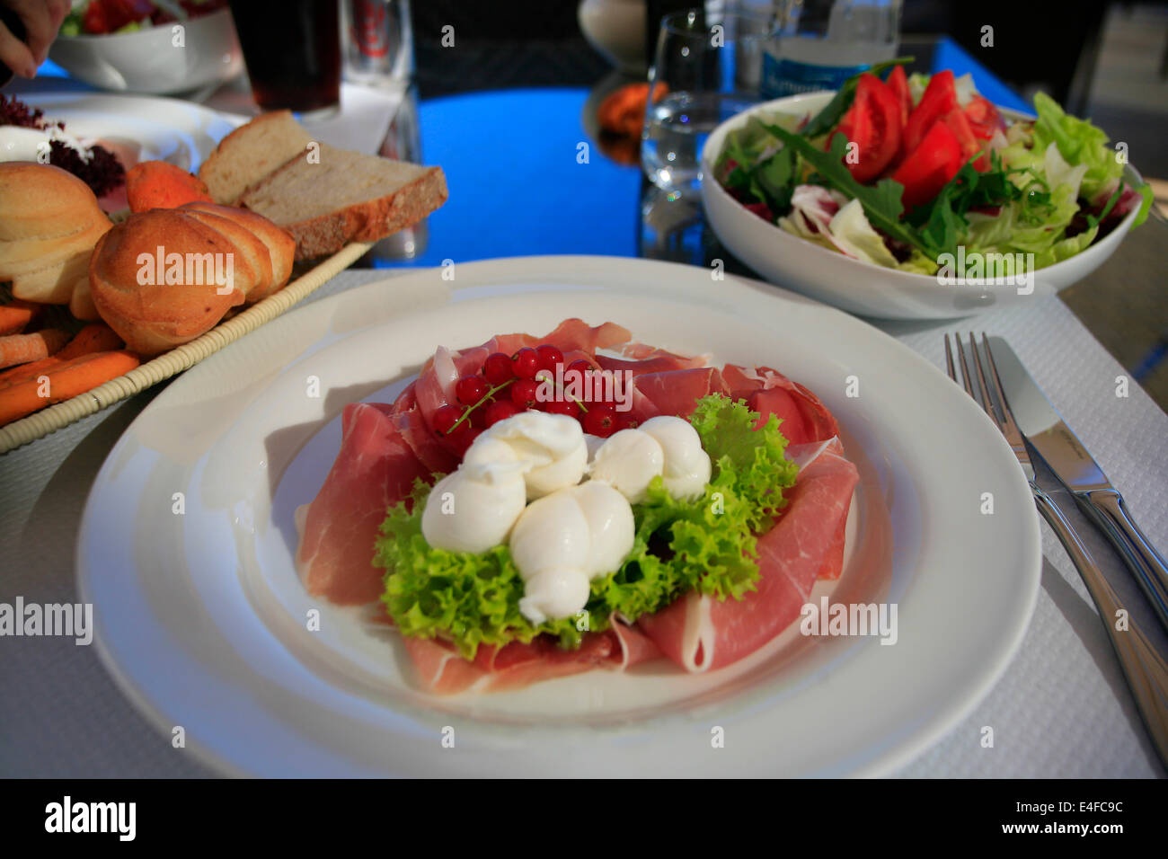 Parma ham salad with burrata Stock Photo Alamy