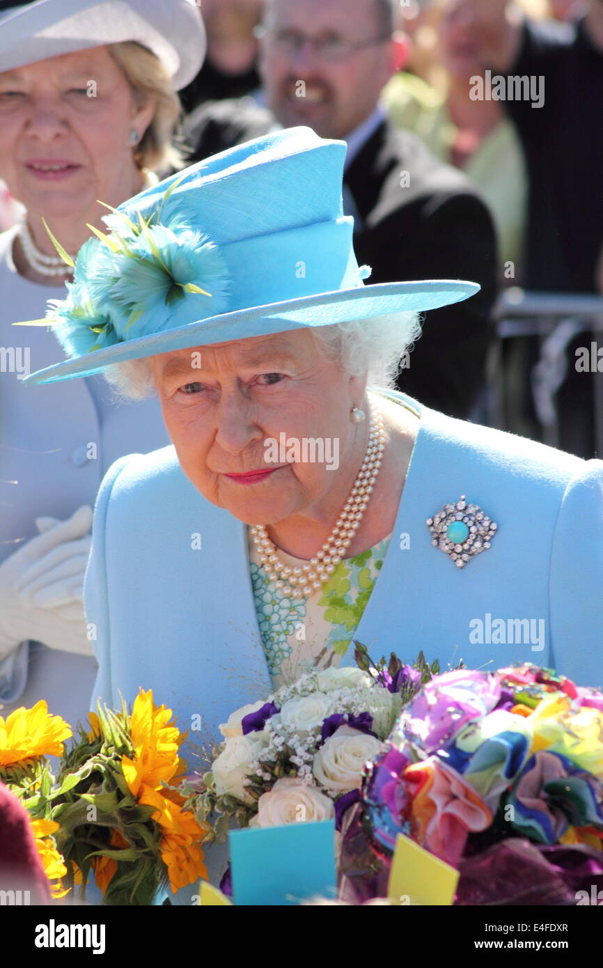 Matlock, Derbyshire, UK. 10th July 2014.  Queen Elizabeth II and the Duke of Edinburgh are received by Mr. William Tucker, Lord-Lieutenant of Derbyshire on arrival at Matlock Station ahead of a visit to luxury knitwear manufacturer, John Smedley and Chatsworth House. Credit:  Matthew Taylor/Alamy Live News Stock Photo