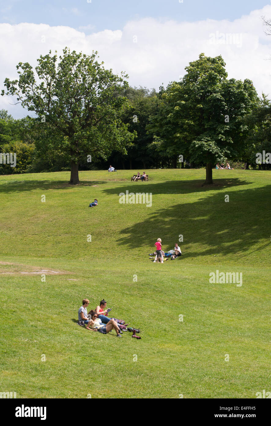 People enjoying the sunshine in Calverley Grounds, Royal Tunbridge