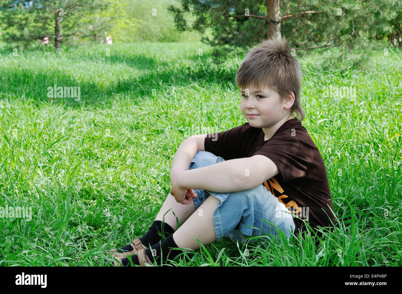 A boy in summer park Stock Photo - Alamy