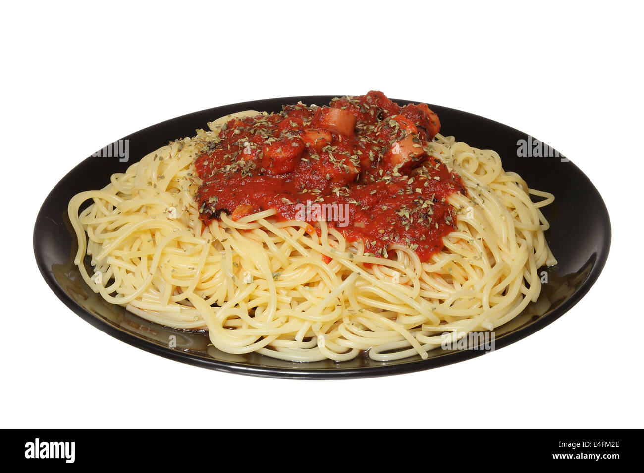 Spaghetti with tomato and sausage isolated on white background Stock Photo