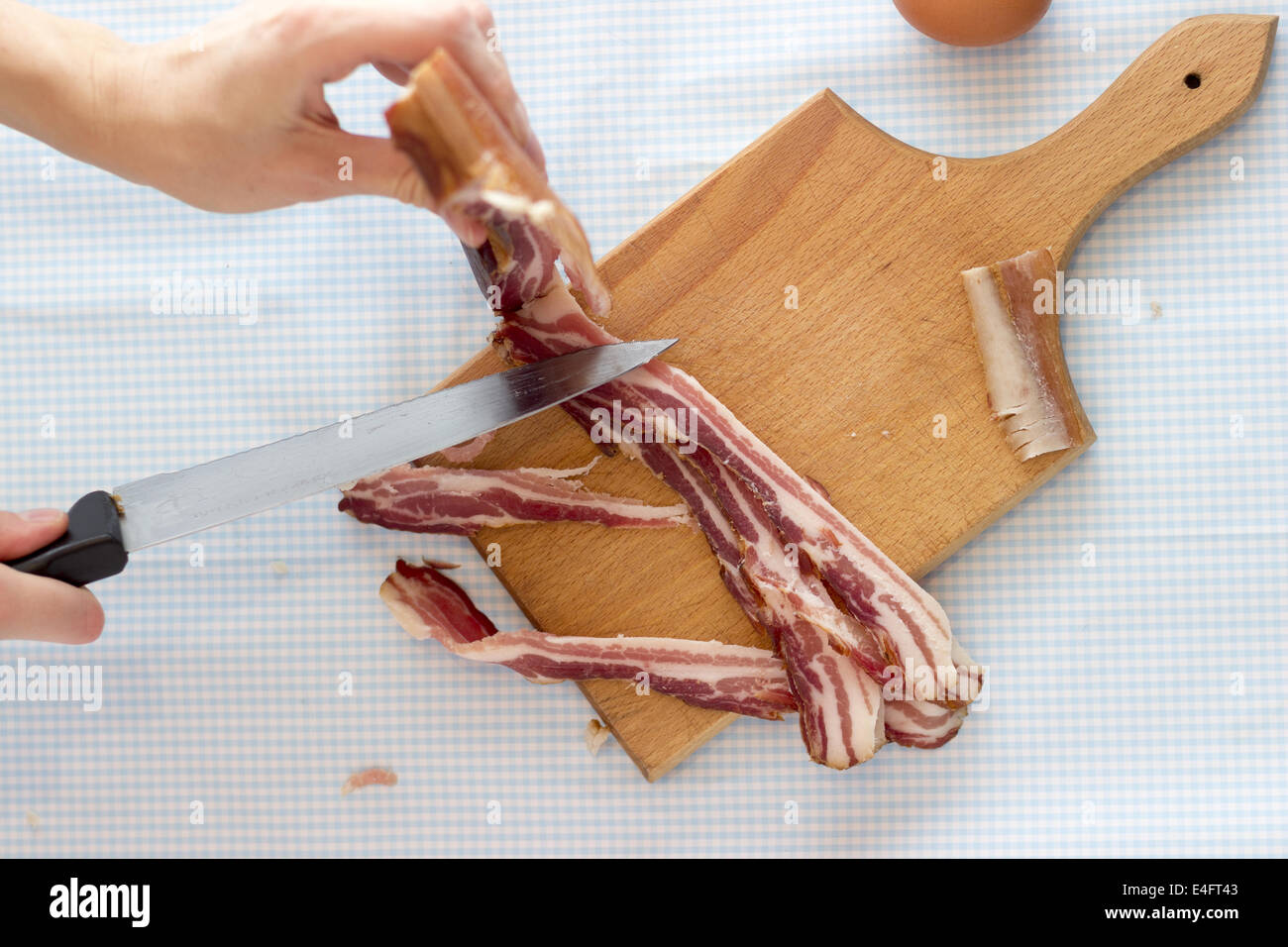 Cutting bacon strips hi-res stock photography and images - Alamy