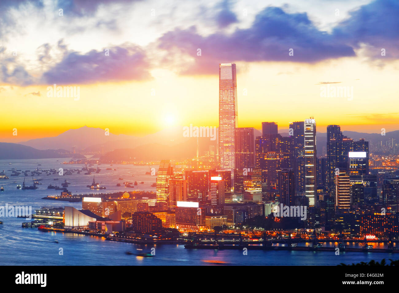HongKong sunset with office buildings Stock Photo - Alamy