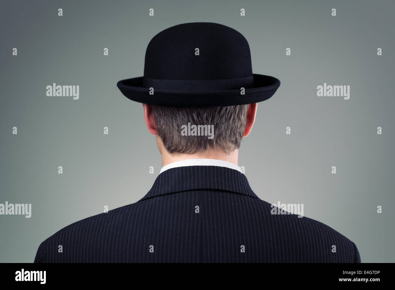 Businessman in bowler hat Stock Photo