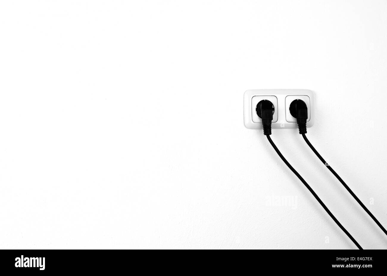 double electric outlet with 2 cables Stock Photo Alamy