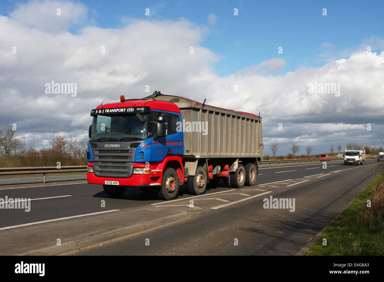 An S J Transport Ltd Tipping Truck Traveling Along The 6 Dual Carriageway In Leicestershire England Stock Photo Alamy