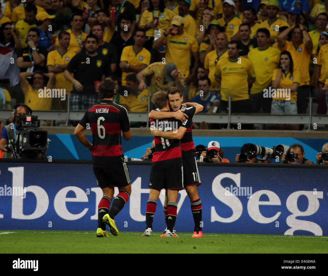 08.07.2014. Estadio Mineirao, Belo Horizonte, Brazil. FIFA World Cup 2014 semi-final soccer match between Brazil and Germany at Estadio Mineirao. Klose celebrates with Lahm after his goal and sets a new world cup record for goals scored Stock Photo