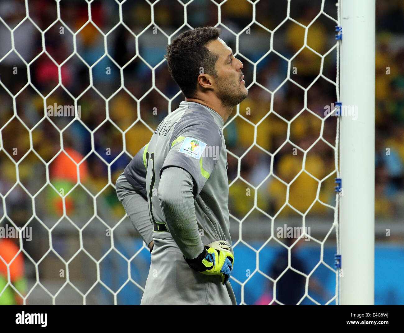 08.07.2014. Estadio Mineirao, Belo Horizonte, Brazil. FIFA World Cup 2014 semi-final soccer match between Brazil and Germany at Estadio Mineirao. Julio Cesar disappointed after seventh goal Stock Photo