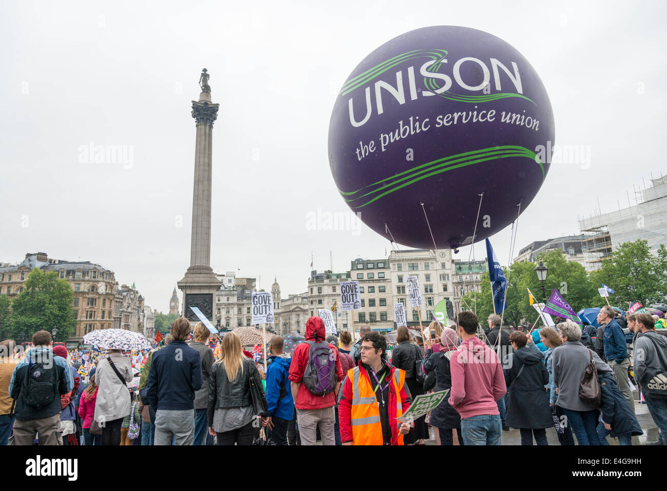 Trafalgar Square London UK 10th July 2014.  Protestors  in Trafalgar Square protest against low pay. Thousands of public sector workers held a one day strike and marched through London ending with a rally and speeches in Trafalgar Square.  Credit Julian Eales/Alamy Live News Stock Photo