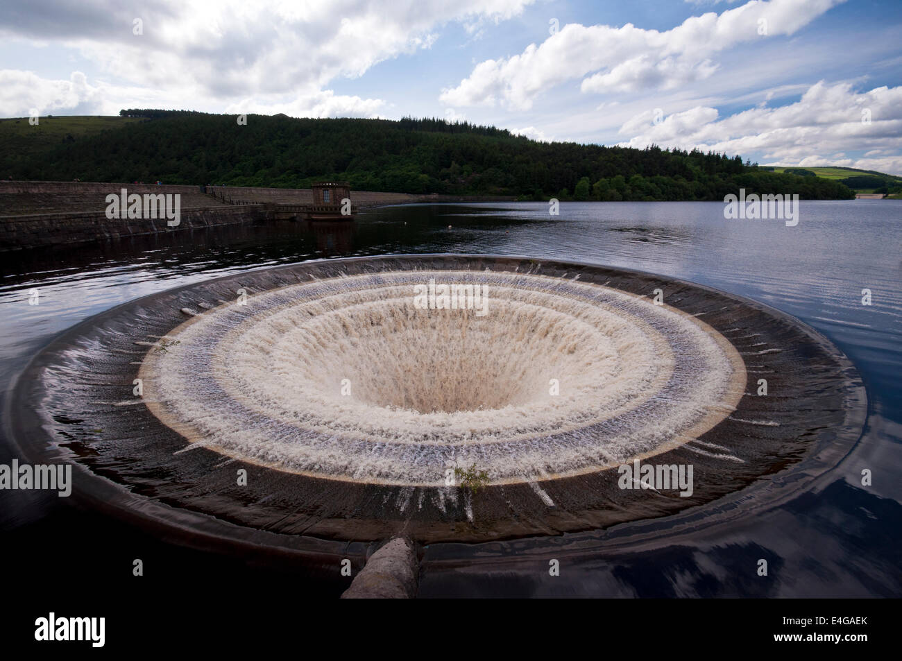 Overflow or Bellmouth, Ladybower Reservoir in the Peak District National Park. The reservoir has two of these overflows. Stock Photo