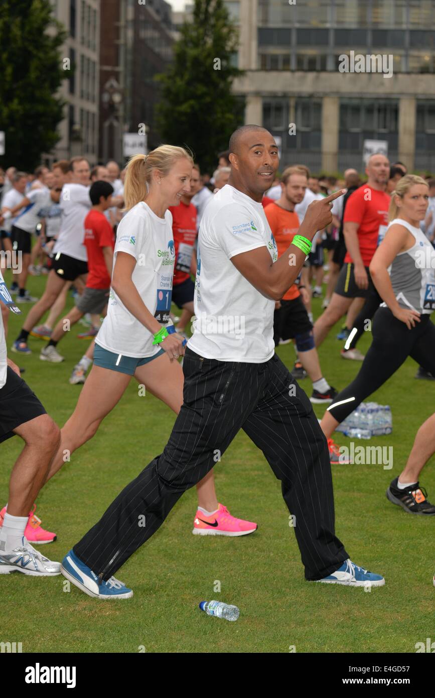 London, UK. 10th July, 2014. Colin Jackson warm up before the race at the Standard Chartered Great City Race 2014 in London. Credit:  See Li/Alamy Live News Stock Photo
