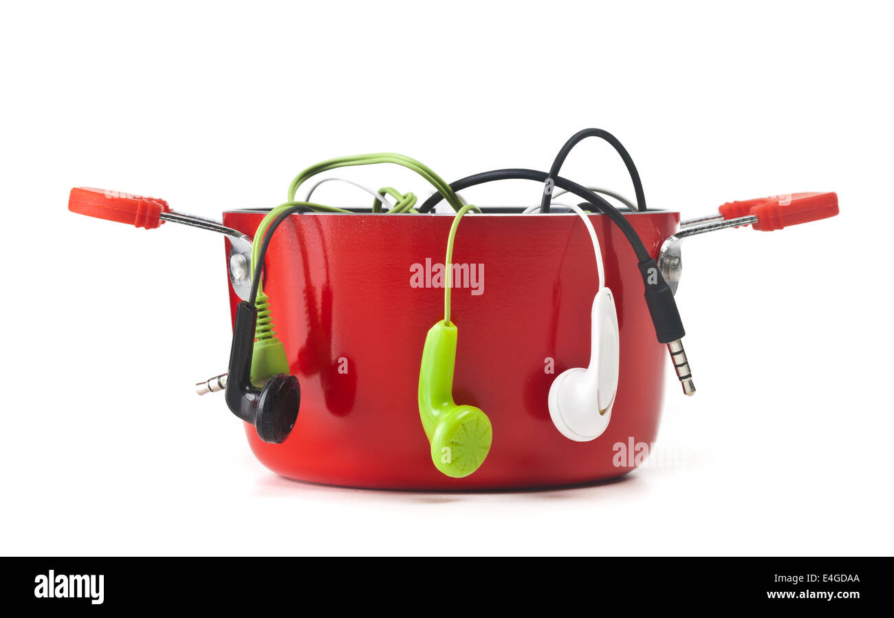 Music headphones in red pot on white background Stock Photo