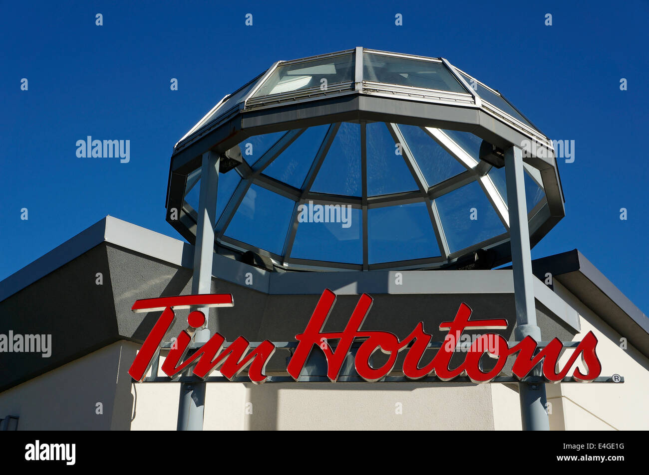 Tim Hortons coffee shop and restaurant sign in Vancouver, BC, Canada Stock Photo