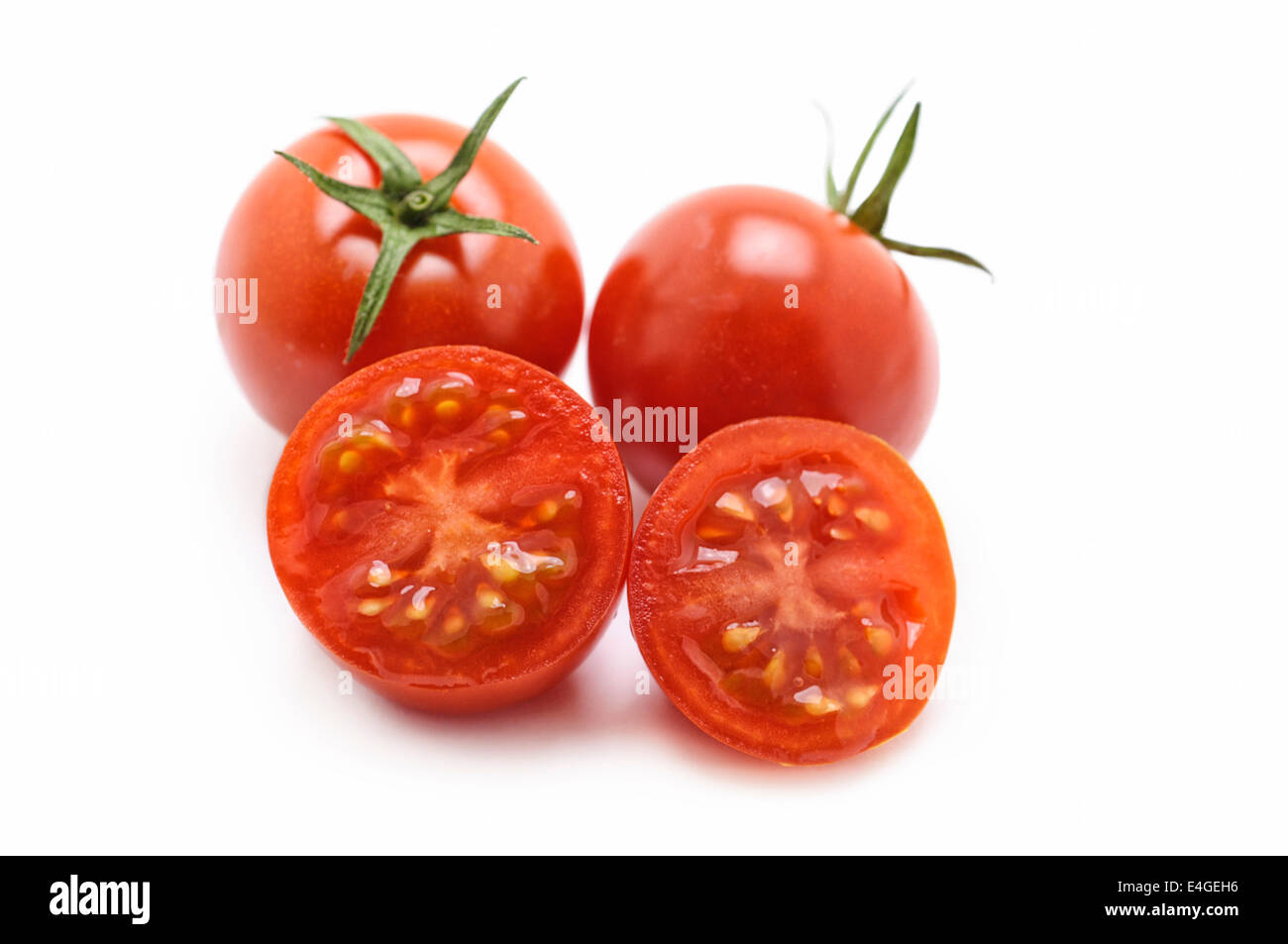 Cherry Tomatoes Whole and Sliced Stock Photo