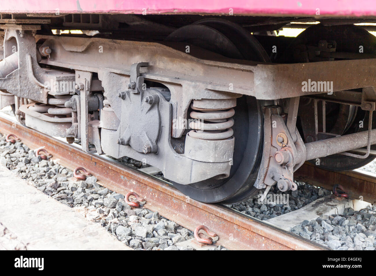 closeup wheel break and suspension system of diesel train Stock Photo