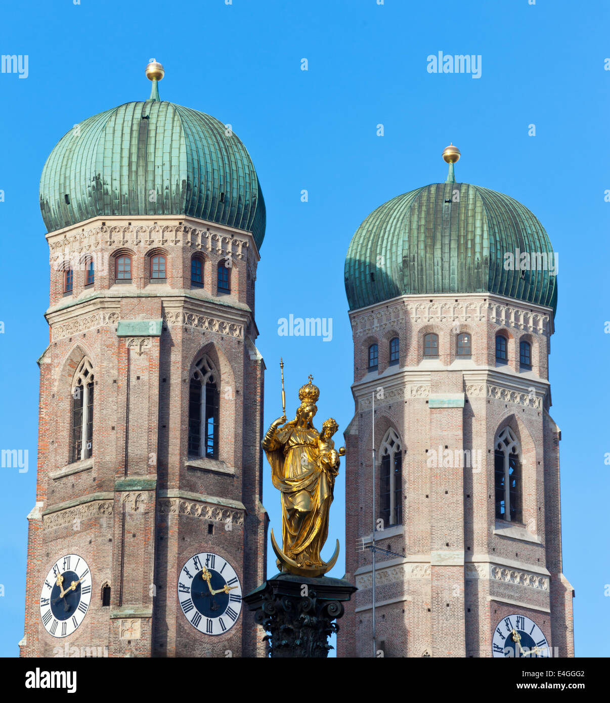 The golden sculpture of Saint Mary and the Church of Our Lady ...