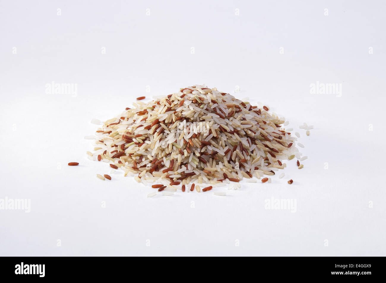 Heap of mixes Thai brown rice isolated on white background Stock Photo