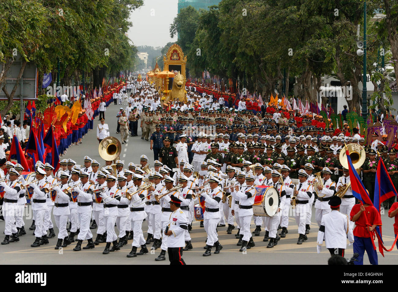 Phnom Penh, Cambodia. 11th July, 2014. The late Cambodian King Sihanouk's remains are marched through streets in Phnom Penh, Cambodia, July 11, 2014. Thousands of people attended a religious procession on Friday morning to enshrine the remains of Cambodia's most revered King Father Norodom Sihanouk, who died of illness in Beijing in 2012. Credit:  Phearum/Xinhua/Alamy Live News Stock Photo