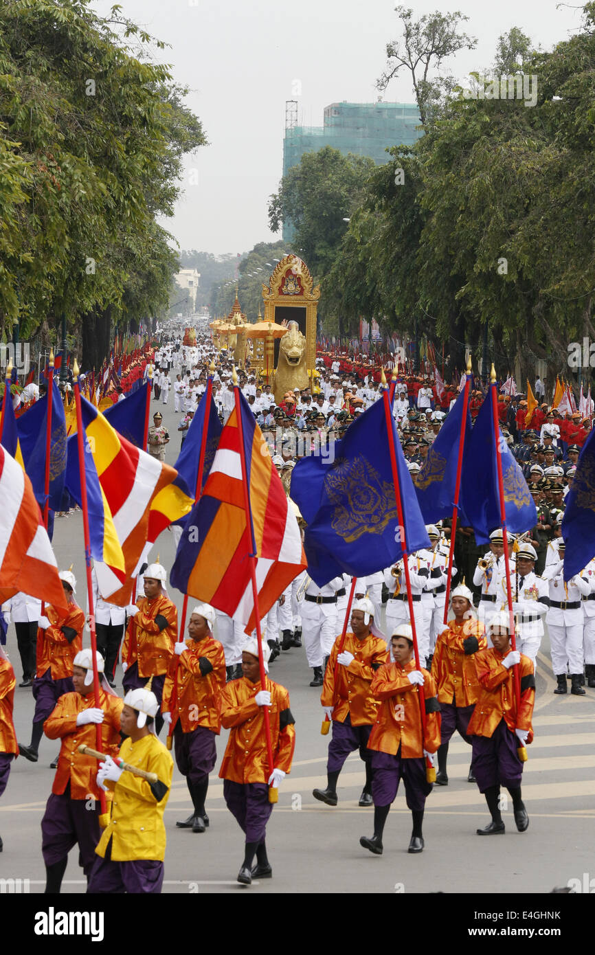 Phnom Penh, Cambodia. 11th July, 2014. The late Cambodian King Sihanouk's remains are marched through streets in Phnom Penh, Cambodia, July 11, 2014. Thousands of people attended a religious procession on Friday morning to enshrine the remains of Cambodia's most revered King Father Norodom Sihanouk, who died of illness in Beijing in 2012. Credit:  Phearum/Xinhua/Alamy Live News Stock Photo