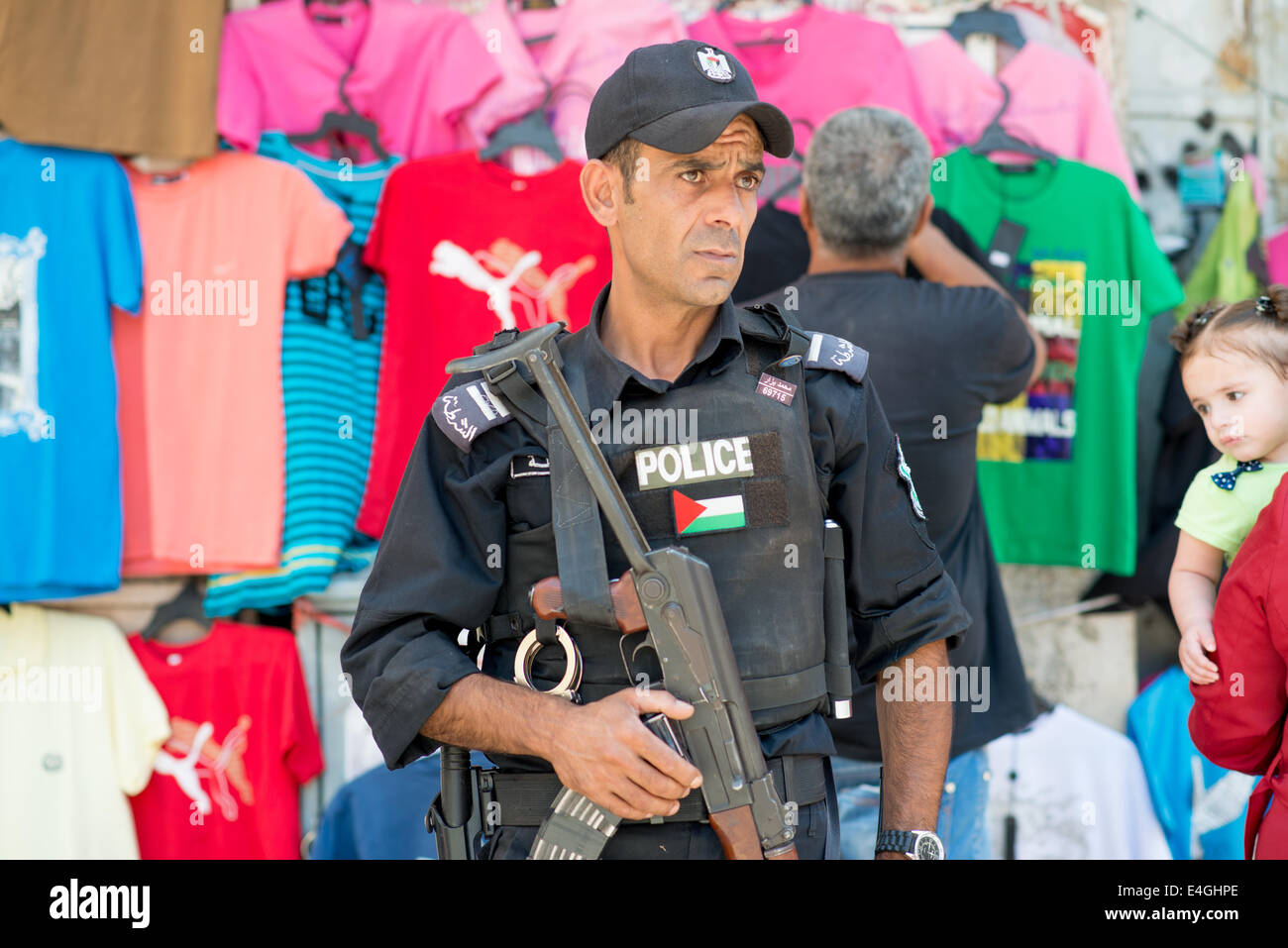 Ramallah. 10th July, 2014. A police officer stands at his post in the ...