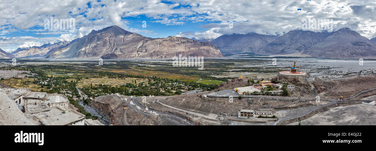 Panorama of Nubra valley in Himalayas with giant Buddha statue in Diskit, Ladakh, India Stock Photo