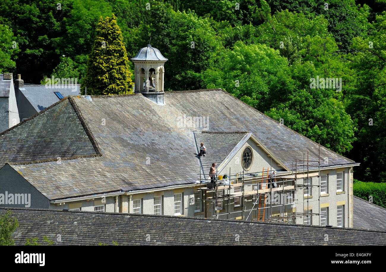 Cressbrook mill millers dale derbyshire england UK. The roof being repaired and renovated Stock Photo