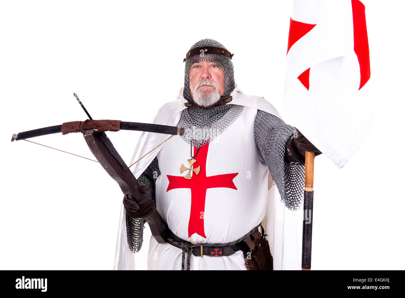 knight-templar-posing-with-crossbow-and-flag-isolated-in-white-E4GKXJ.jpg
